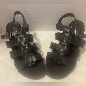 Maurice’s black strapped sandals